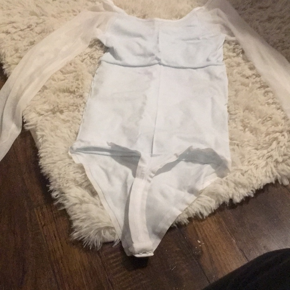 White thong bodysuit with sheer arms